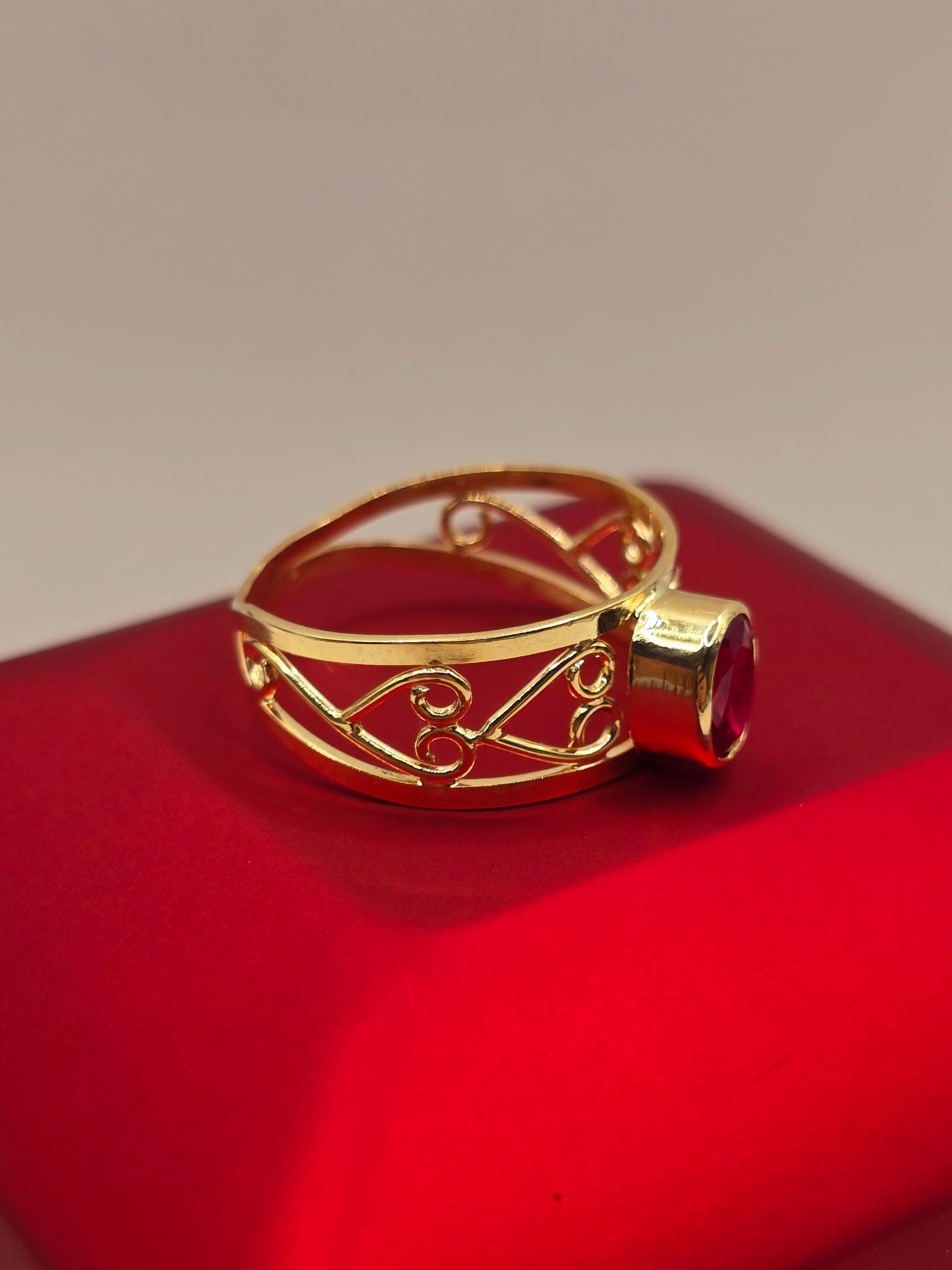 Anillo olimpo rubí 3 grs Oro 18k 9