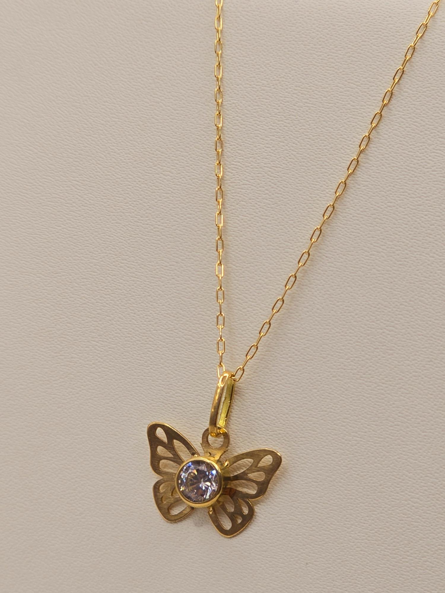 Cadena limada 50 cm y mariposa circón 1.7 cm 2.1 grs Oro 18k 4