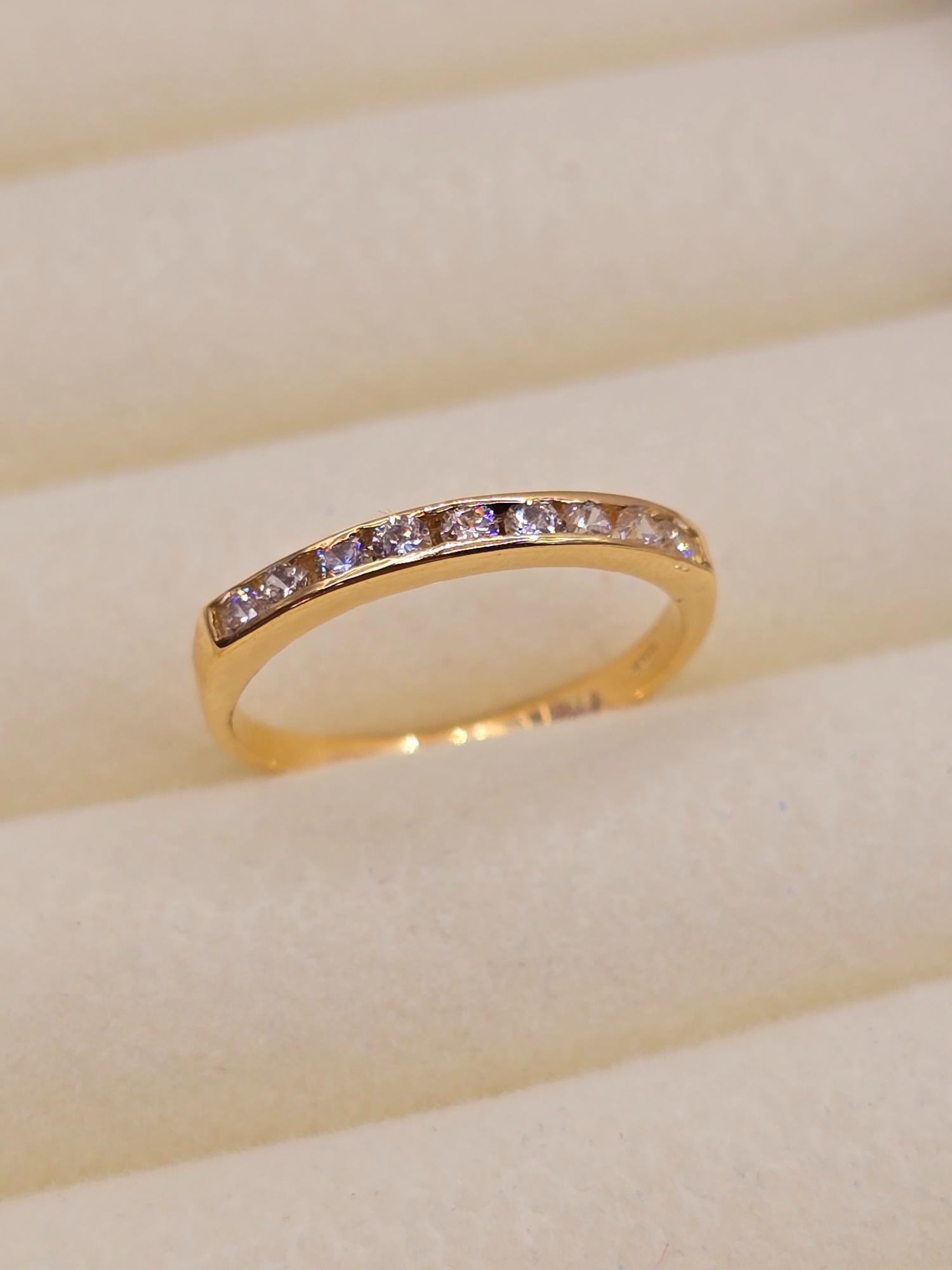 Anillo medio cintillo circones 2 grs Oro 18k 3