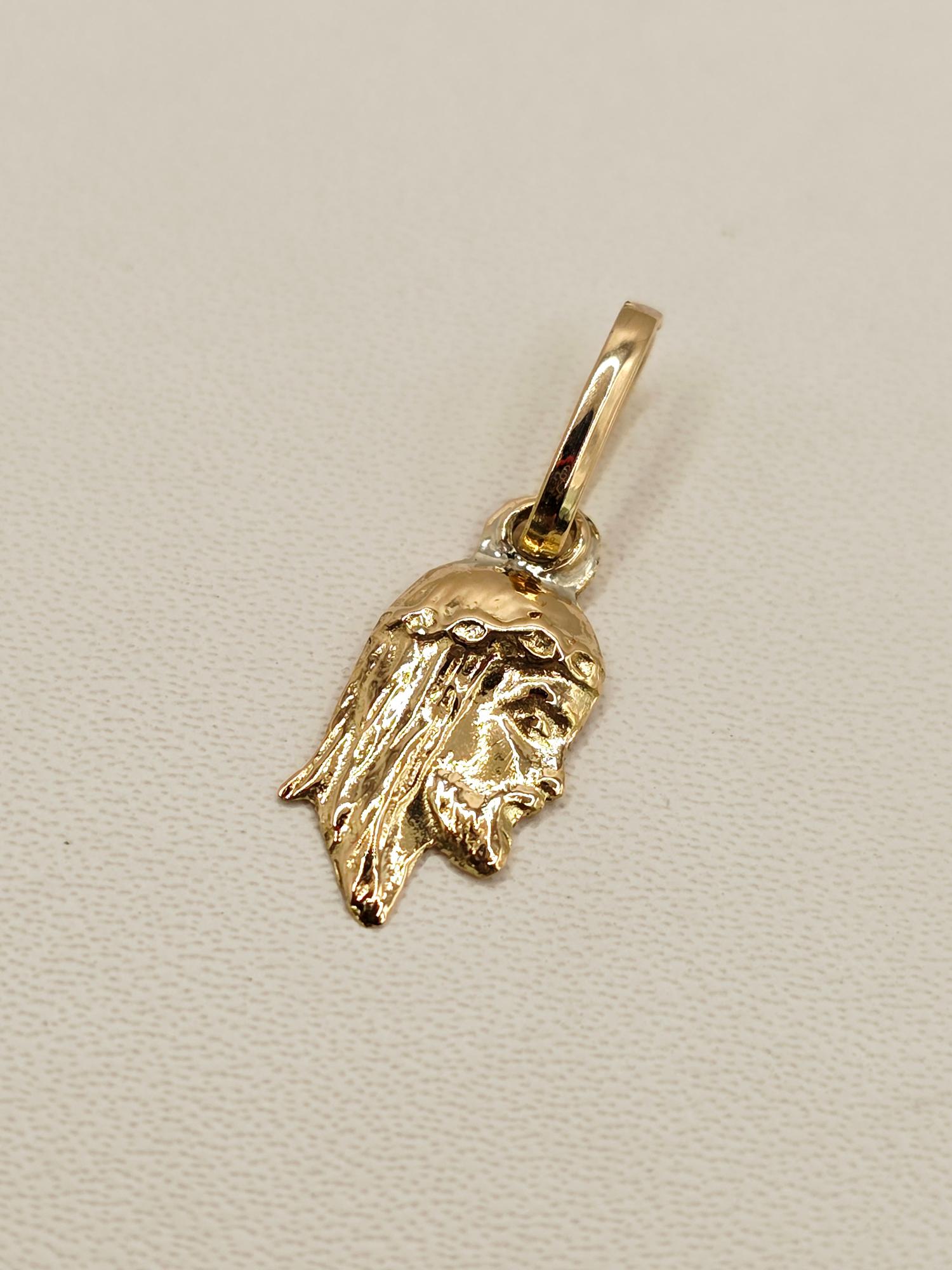 Colgante cara de cristo 2 cm 0.7 grs Oro 18k 1
