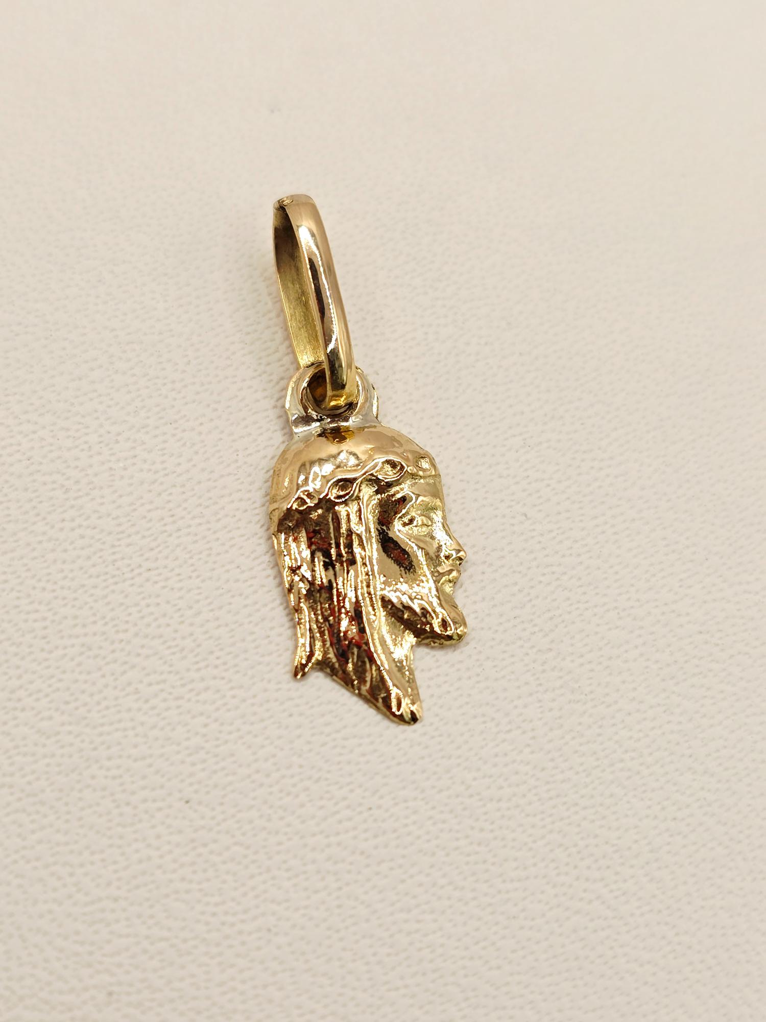 Colgante cara de cristo 2 cm 0.7 grs Oro 18k 5