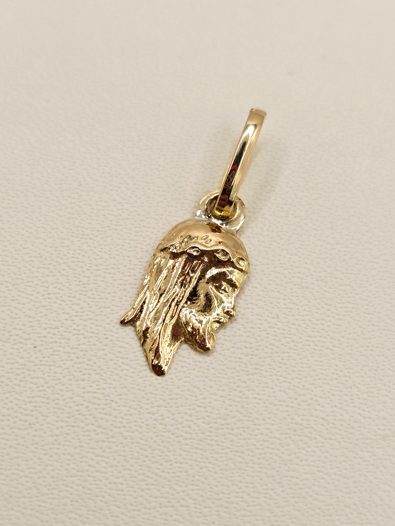 Colgante cara de cristo 2 cm 0.7 grs Oro 18k 6