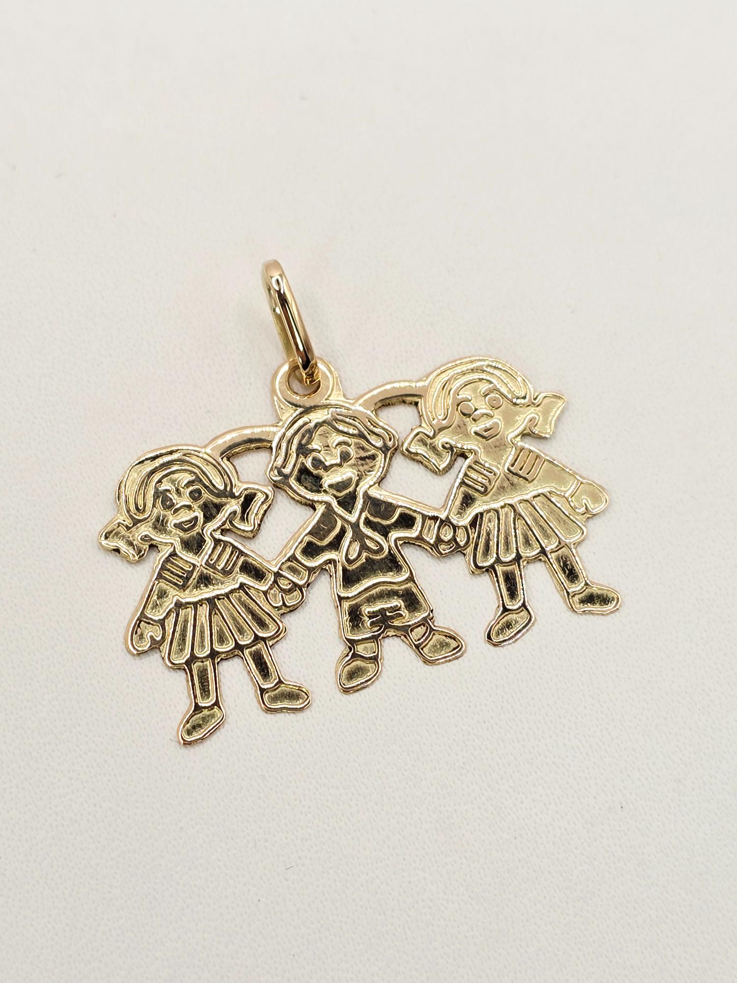 Colgante tres niñ@s 3 cm 2.7 grs Oro 18k 3