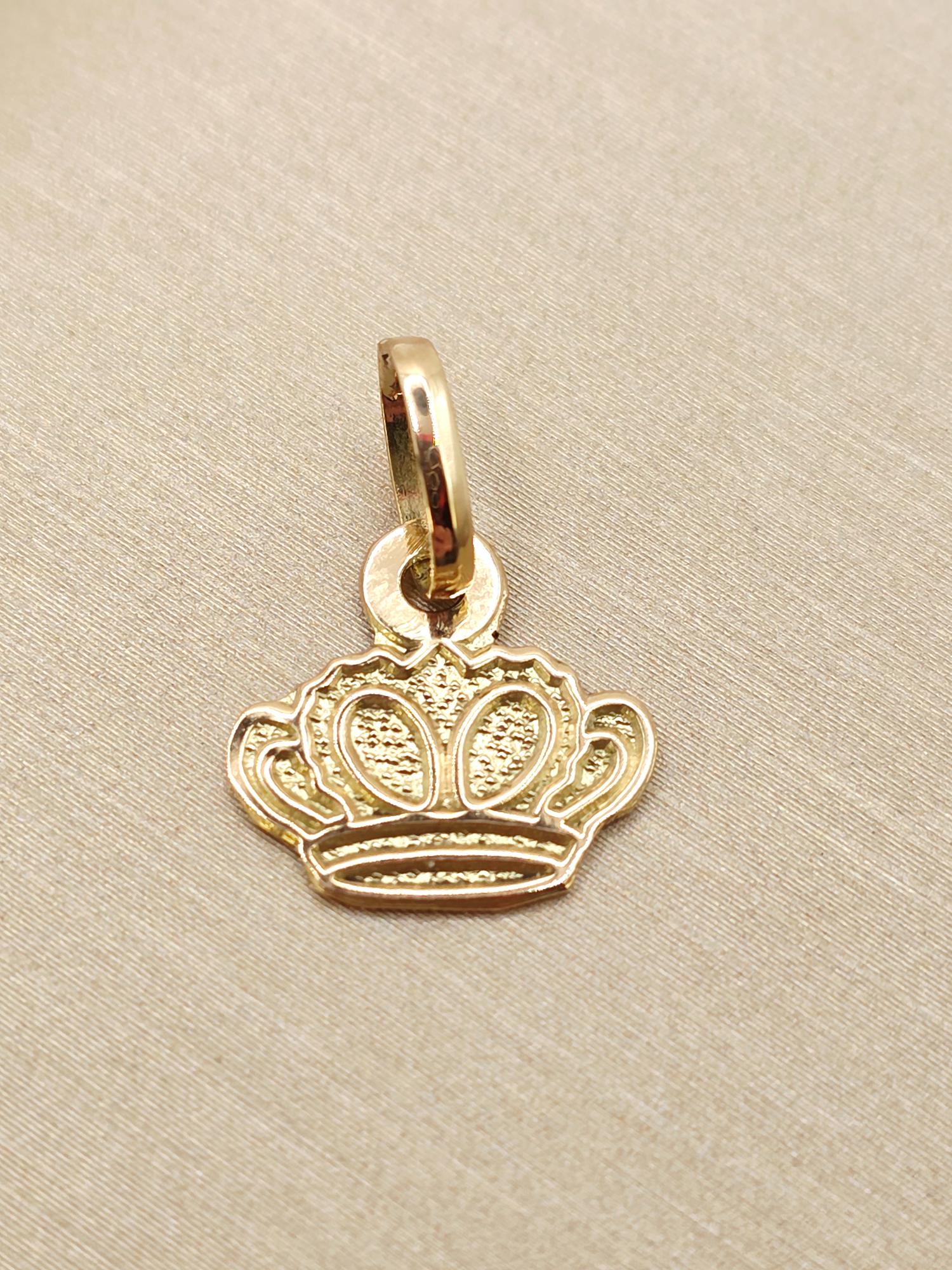 Colgante corona 1.7 cm 0.9 grs Oro 18k 1