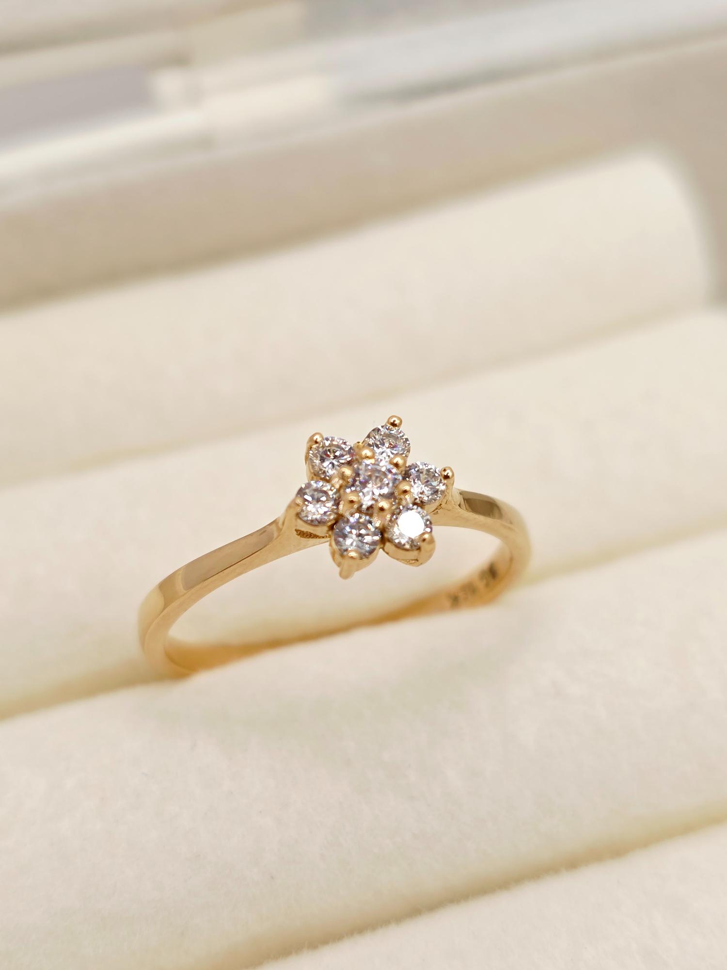 Anillo roseta circones 2.1 grs Oro 18k 2