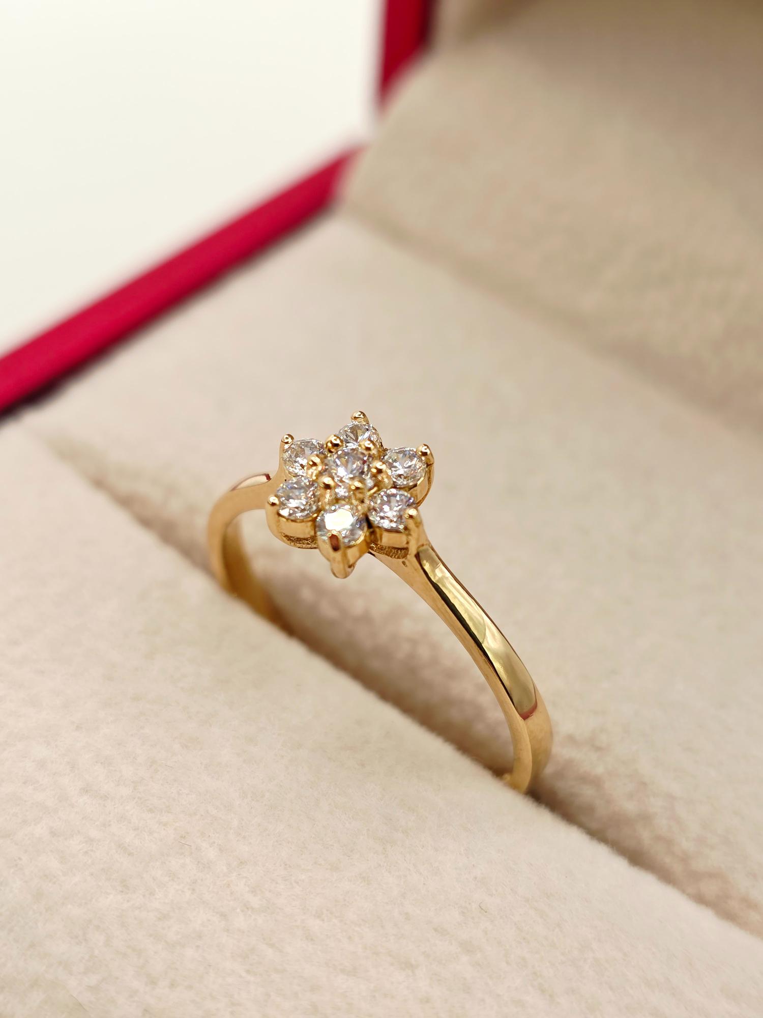 Anillo roseta circones 2.1 grs Oro 18k 6