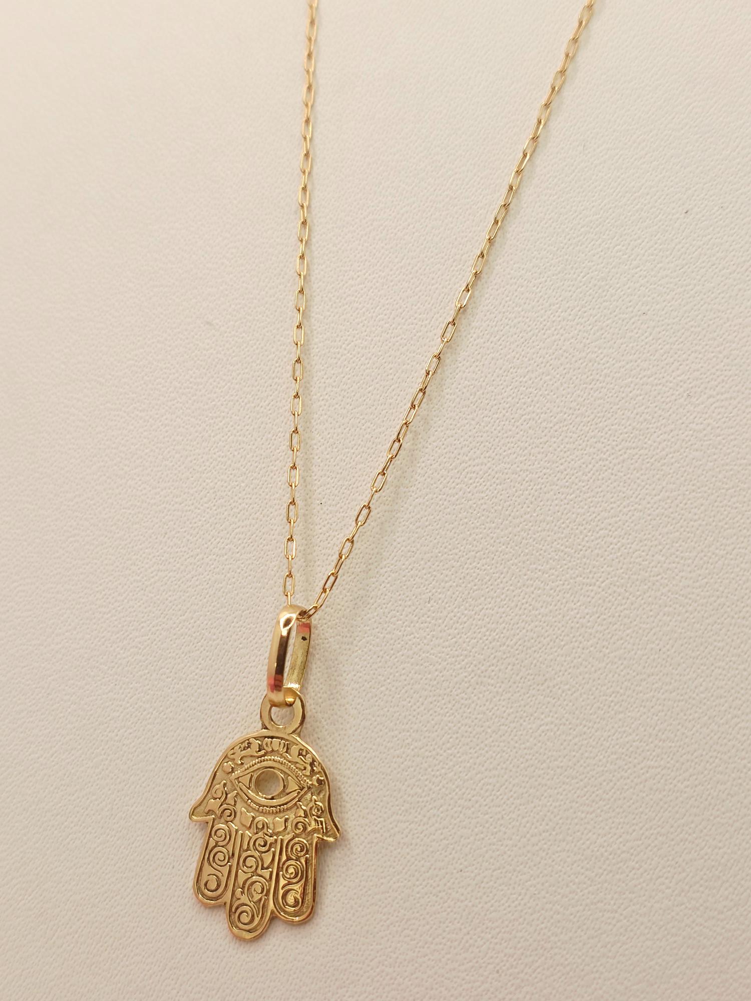 Cadena limada 50 cm y mano de fátima 2 cm 2.3 grs Oro 18k 4