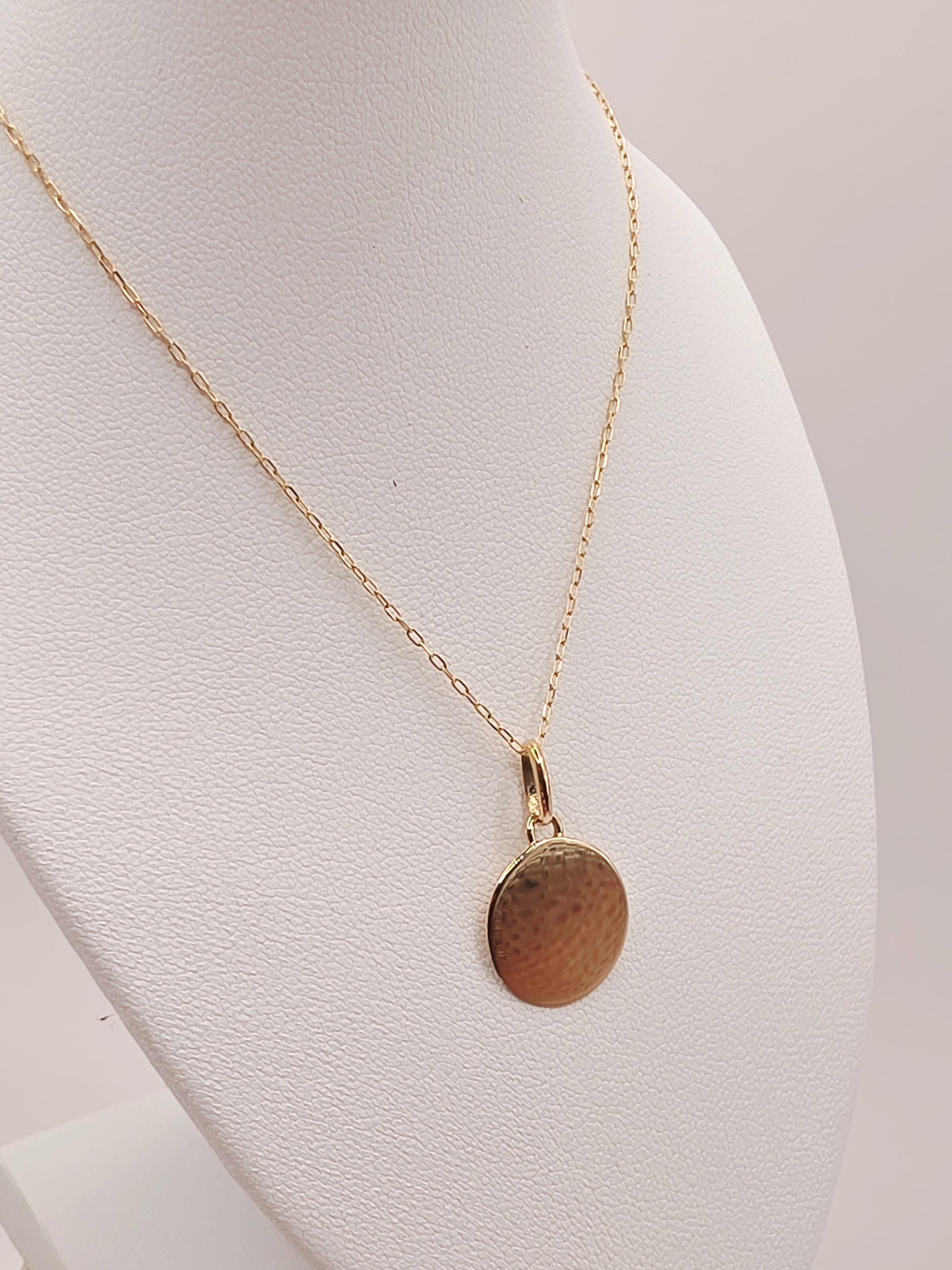 Cadena limada 50 cm con colgante disco liso 1.4 cm 2.2 grs Oro 18k 3