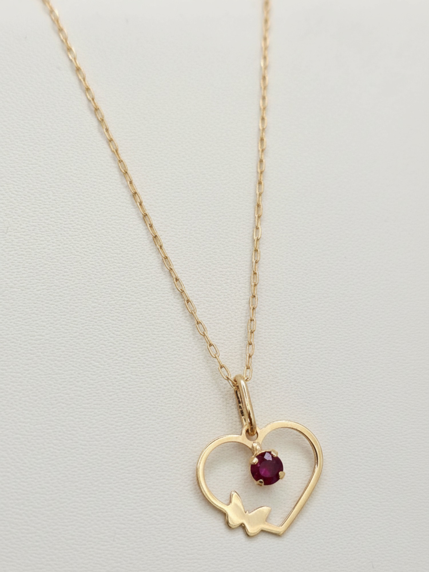 Cadena limada 50 cm y colgante corazón 2.2 cm rubi 1.7 grs Oro 18k 5