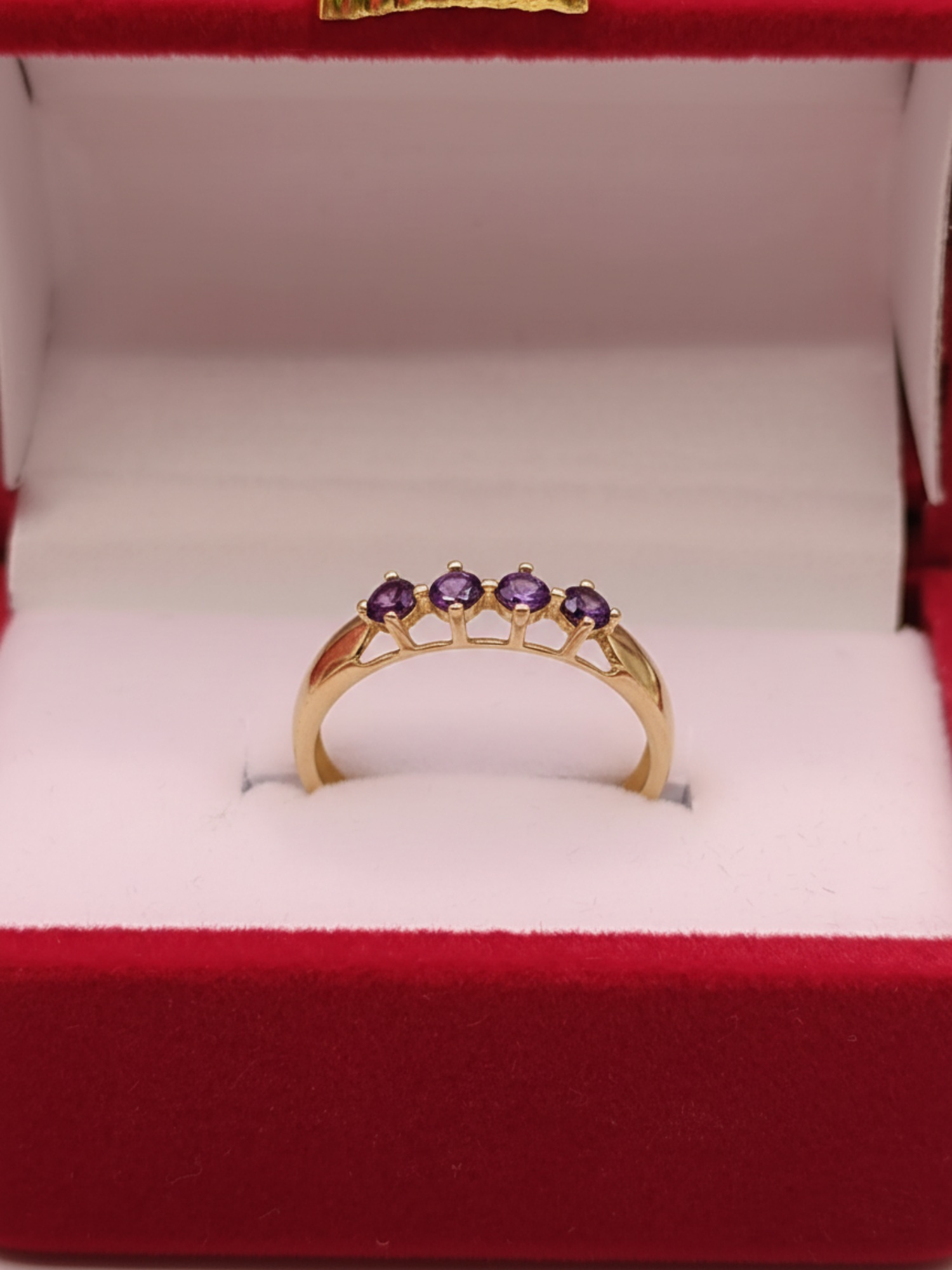 Anillo medio cintillo amatistas 1.6 grs Oro 18k 3