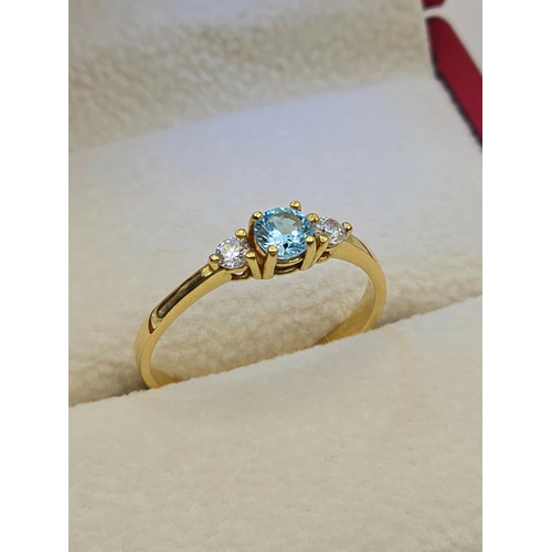 Anillo princesa aguamarina y circones 2.3 grs Oro 18k