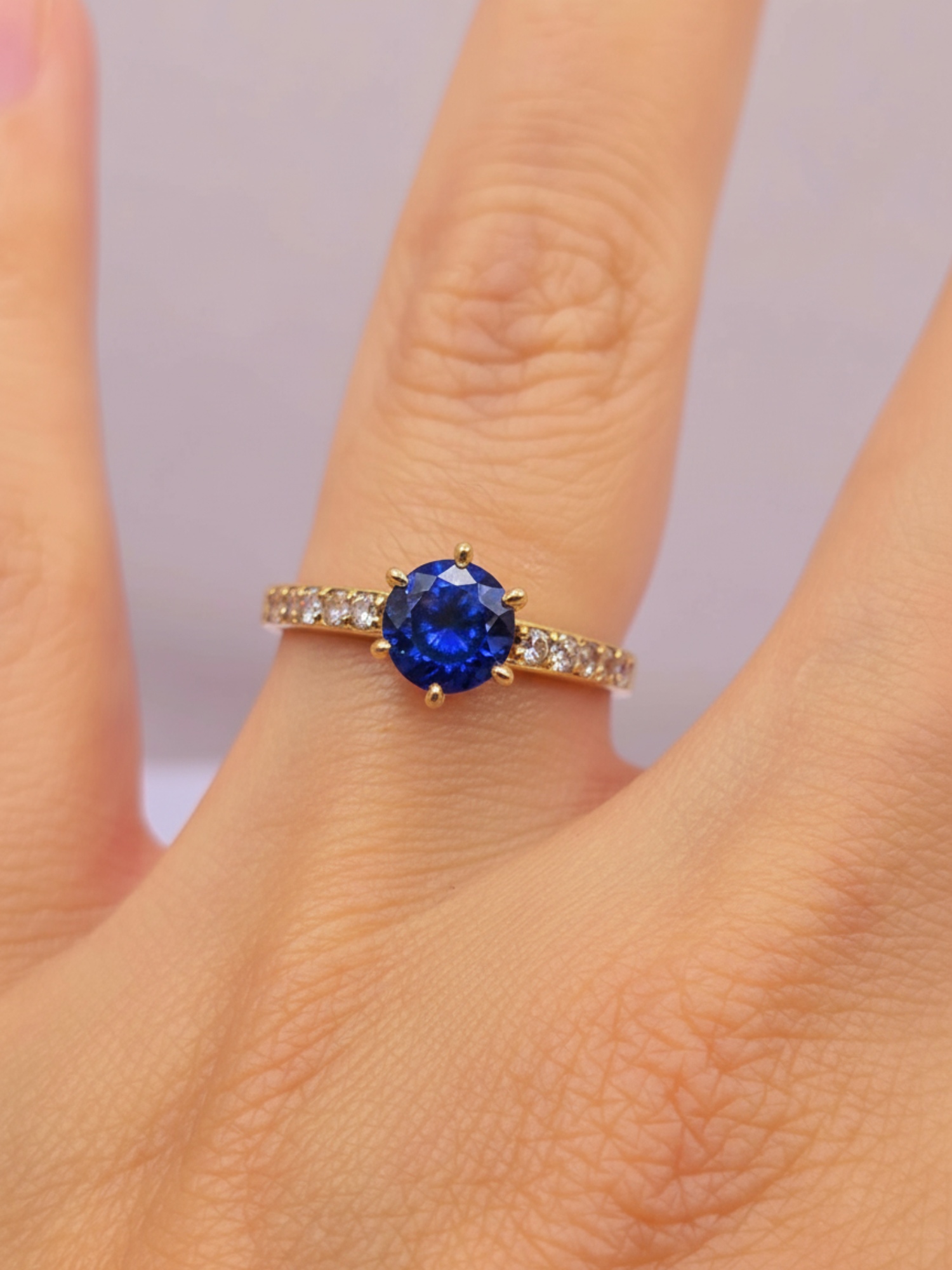 Anillo solitario medio cintillo zafiro 3 grs Oro 18k 4