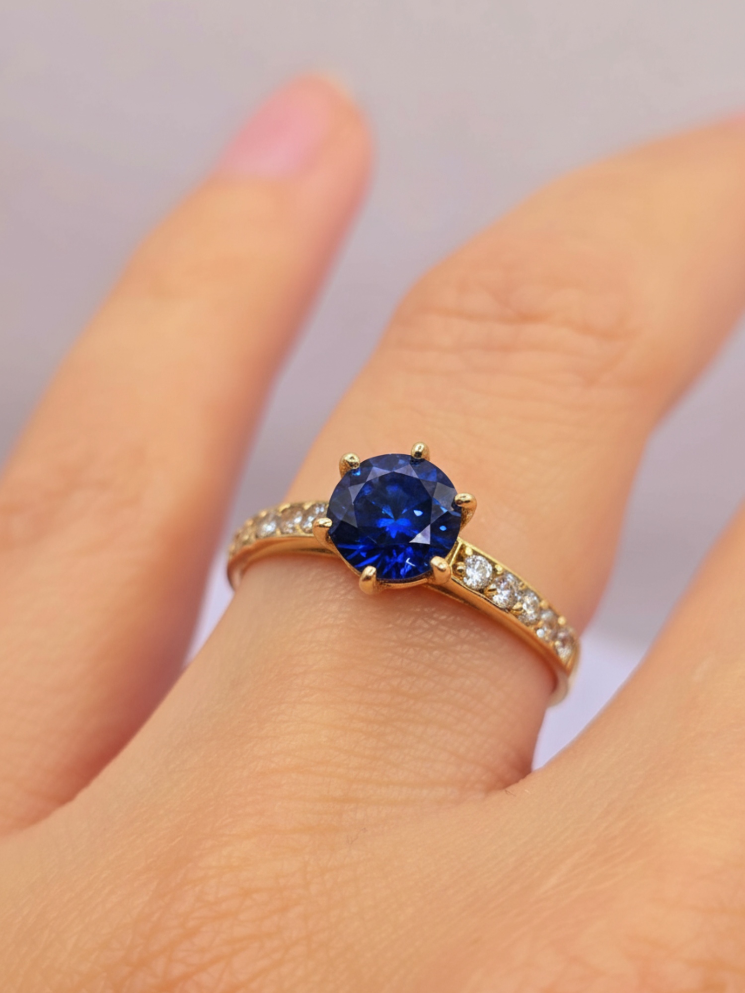 Anillo solitario medio cintillo zafiro 3 grs Oro 18k 2