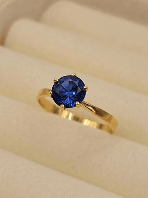 Anillo solitario seis grifas zafiro 2 grs Oro 18k
