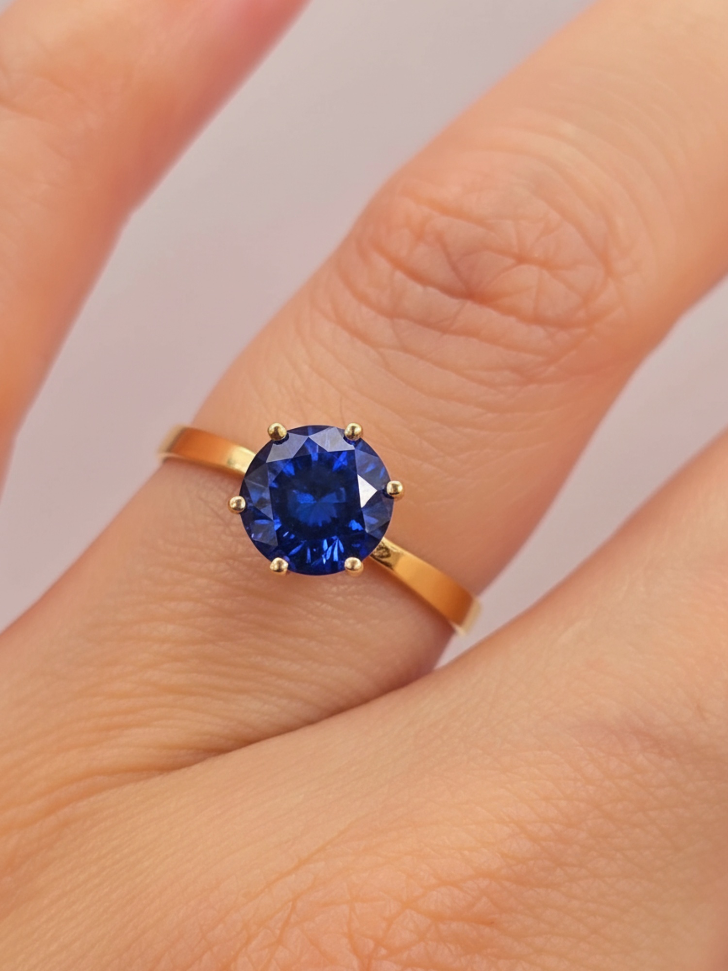 Anillo solitario seis grifas zafiro 2 grs Oro 18k 6