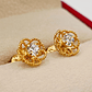 Aros doble flor panal circón 9 mm 2.1 grs Oro 18k - Miniatura 1