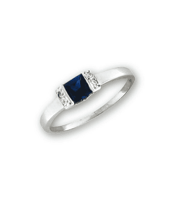  Anillo Oro blanco rodin. 4 brill. 1 pto., 1 zafiro carré 4mm