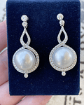 Aros de 1 Kilate en Brillantes y perlas cultivadas en Oro Blanco 18kl 
