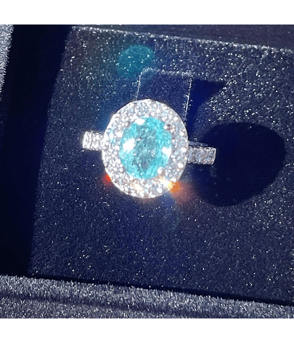 Espectacular Anillo Gran Turmalina Paraiba Ovalada con Halo de Diamantes en Platino