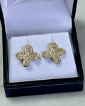 Aros Flores Diamantes en Oro Amarillo 18K