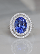 Espectacular Anillo Gran Tanzanita Ovalada con Halo de Brillantes en Platino - Miniatura 1