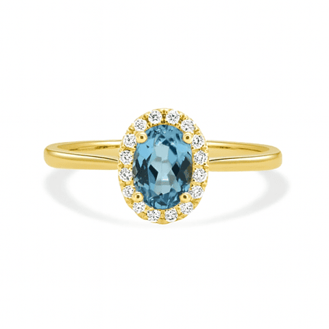 Anillo Aguamarina Ovalada con Halo de Diamantes en Oro Amarillo  18K