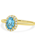 Anillo Aguamarina Ovalada con Halo de Diamantes en Oro Amarillo  18K