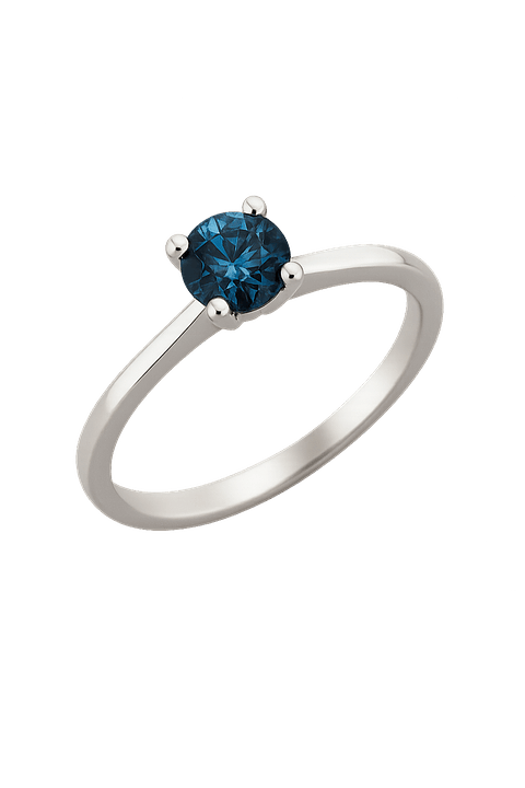 Exclusivo Anillo Solitario Diamantes Azul en Oro Blanco 18K