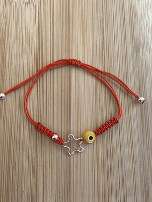 Pulsera de hilo rojo con estrella y ojo turco amarillo