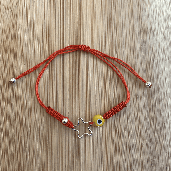 Pulsera de hilo rojo con estrella y ojo turco amarillo 1