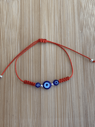 Pulsera de hilo rojo con ojo turco