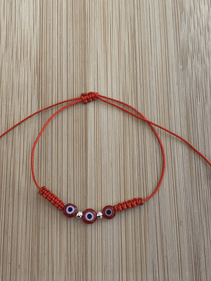 Pulsera de hilo rojo con ojo turco