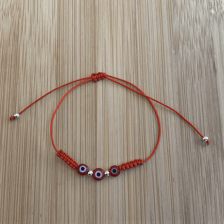 Pulsera de hilo rojo con ojo turco 1