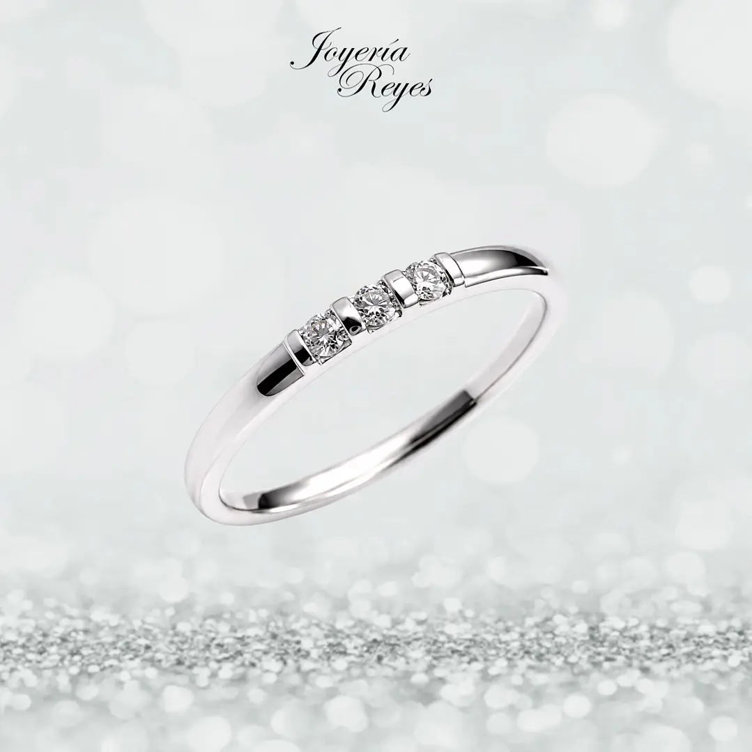 Anillo de Oro Blanco 18 kilates - 3 brillantes de 9 puntos - KR05-85628 1