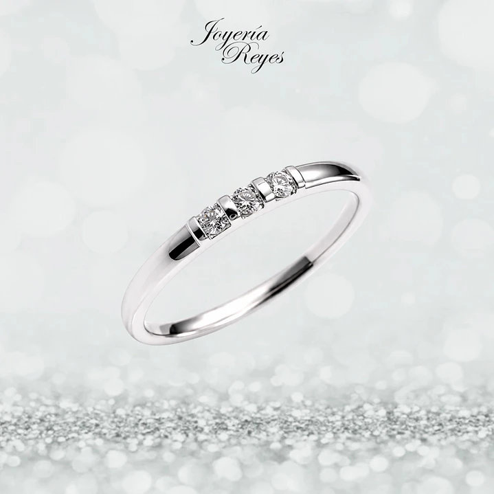 Anillo de Oro Blanco 18 kilates - 3 brillantes de 9 puntos - KR05-85628 1
