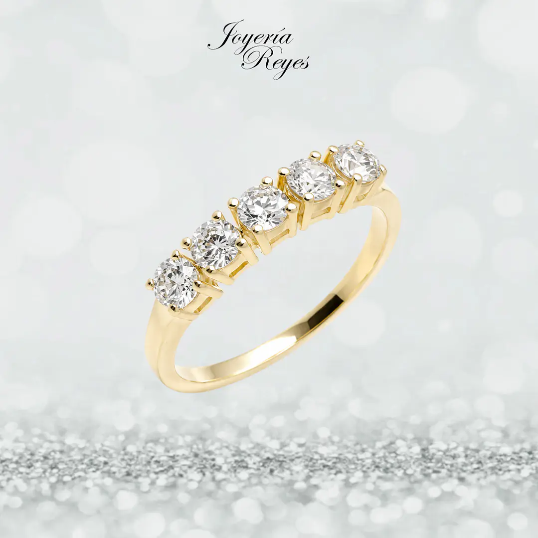 Anillo de Oro Amarillo 18 kilates - 5 Circones - A2640 1