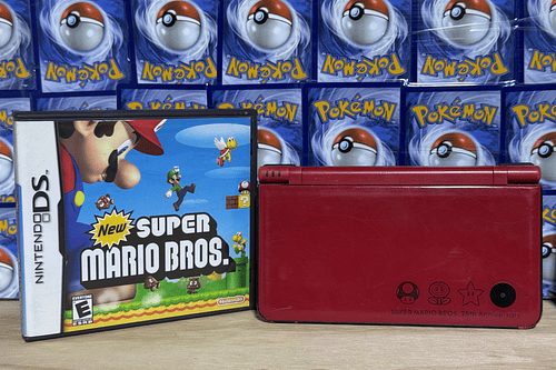 Nintendo DSI XL y Juego New Mario Bros