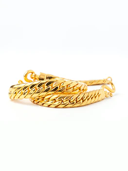 Golden bangled bracelet with braid design