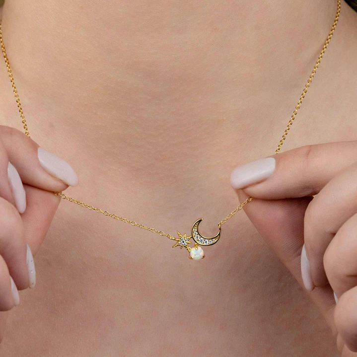 Golden necklace with stars and moon pendant 1