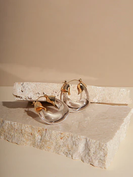 Classic circular transparent earrings with gold details