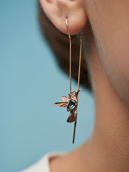 Rose gold earrings with hummingbird pendant