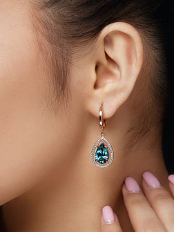 Oval earring with diamond incrustations and gemstone selection
