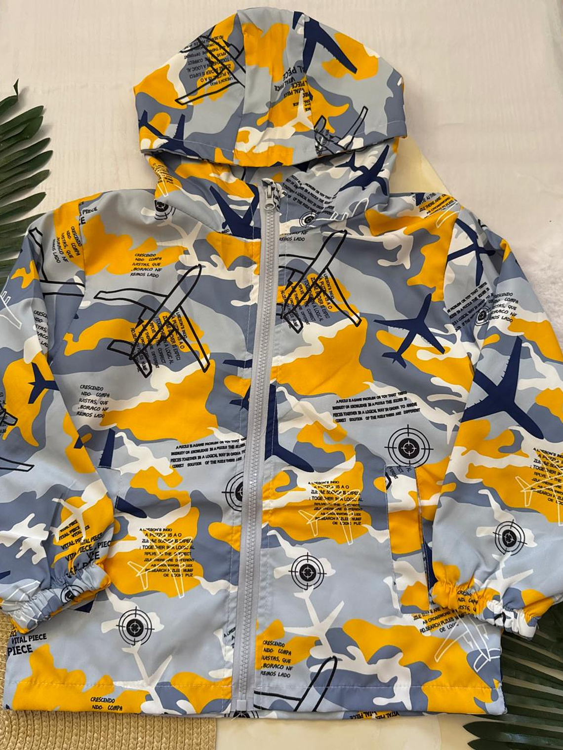 Corta viento infantil avión 1