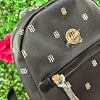 MOCHILA NEGRA TOMMY CON LETRAS BLANCAS