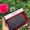 BILLETERA NEGRA GUESS PEGABLE