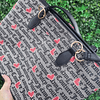 TOTE JUICY GRIS CON NEGRO Y CORAZONES