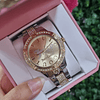 RELOJ JUICY PLATEADO CON DORADO DETALLE CORAZON BRILLOS