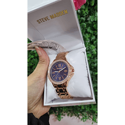 RELOJ STEVE MADDEN DORADO VISOR AZUL