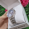 RELOJ STEVE MADDEN PLATEADO VISOR CELESTE