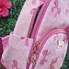 MOCHILA JUICY CINTA ROSADA